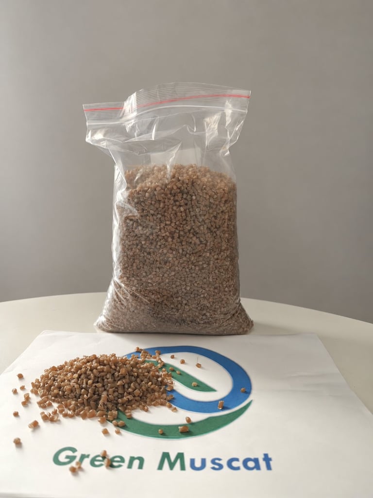 Green Muscat brown polymer granule sample in a bag